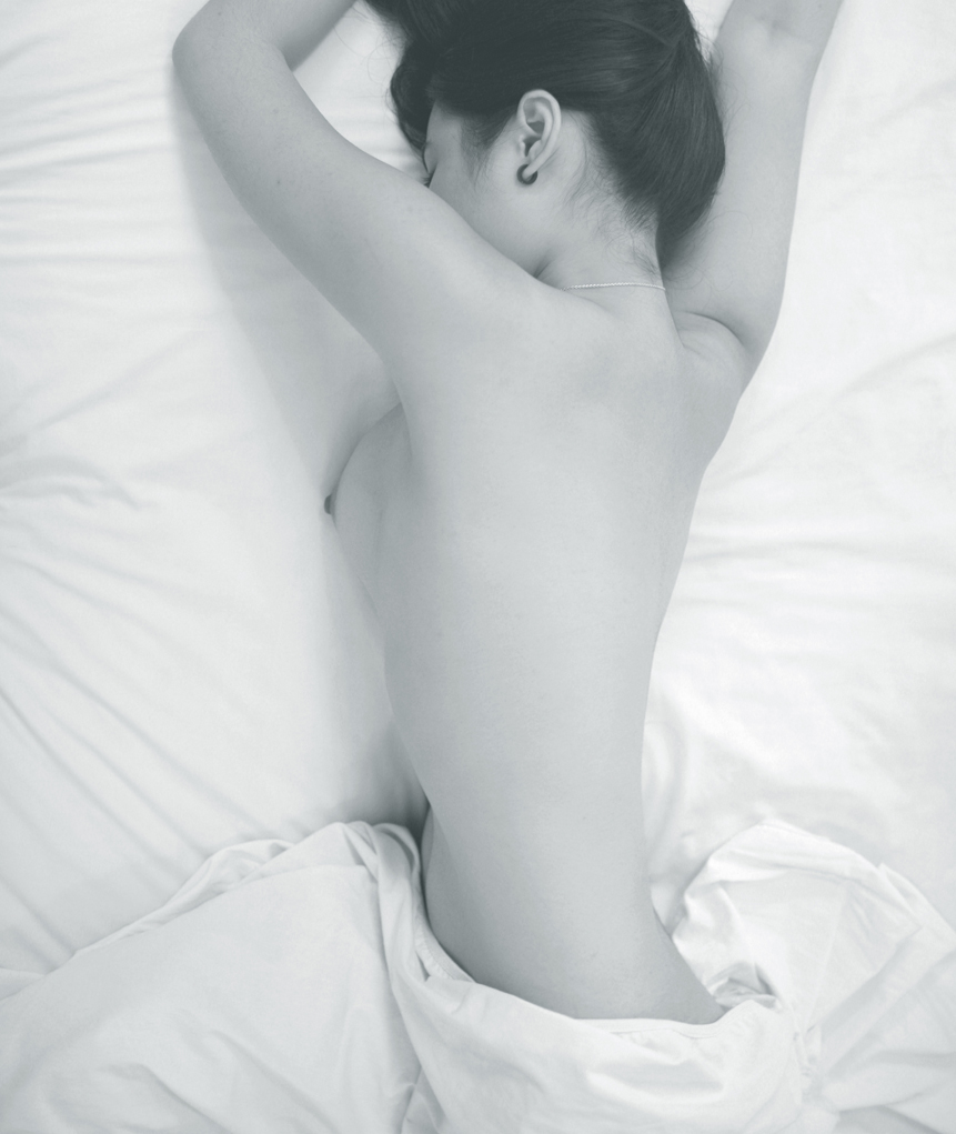 Nude_lying_facedown_on_bed.jpg
